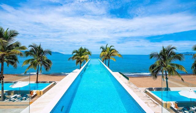 Stunning Beachfront Condo | Sea Views & Pools