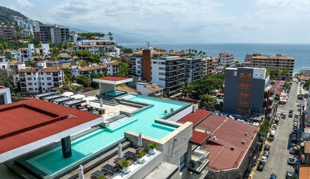 Top Floor Loft Building! Amazing Rooftop Pool!