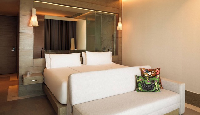 Unwind in Style: Beachfront Resort w/Tranquil Pools, Spa & Delicious Cuisine
