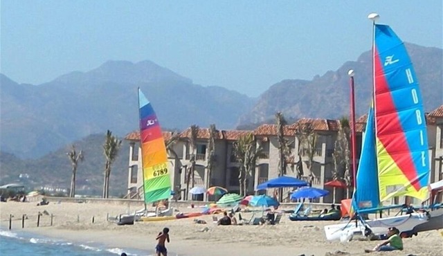 Upscale Bahía Delfín Beach Condominium, one minute walk to the beach