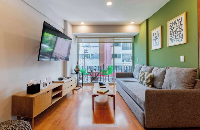Capitalia | Bright balcony + Bike & Leafy Views