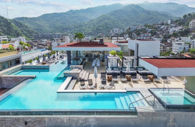 Dedicated workspace, Pool, Gym | Romantic Zone 2BR