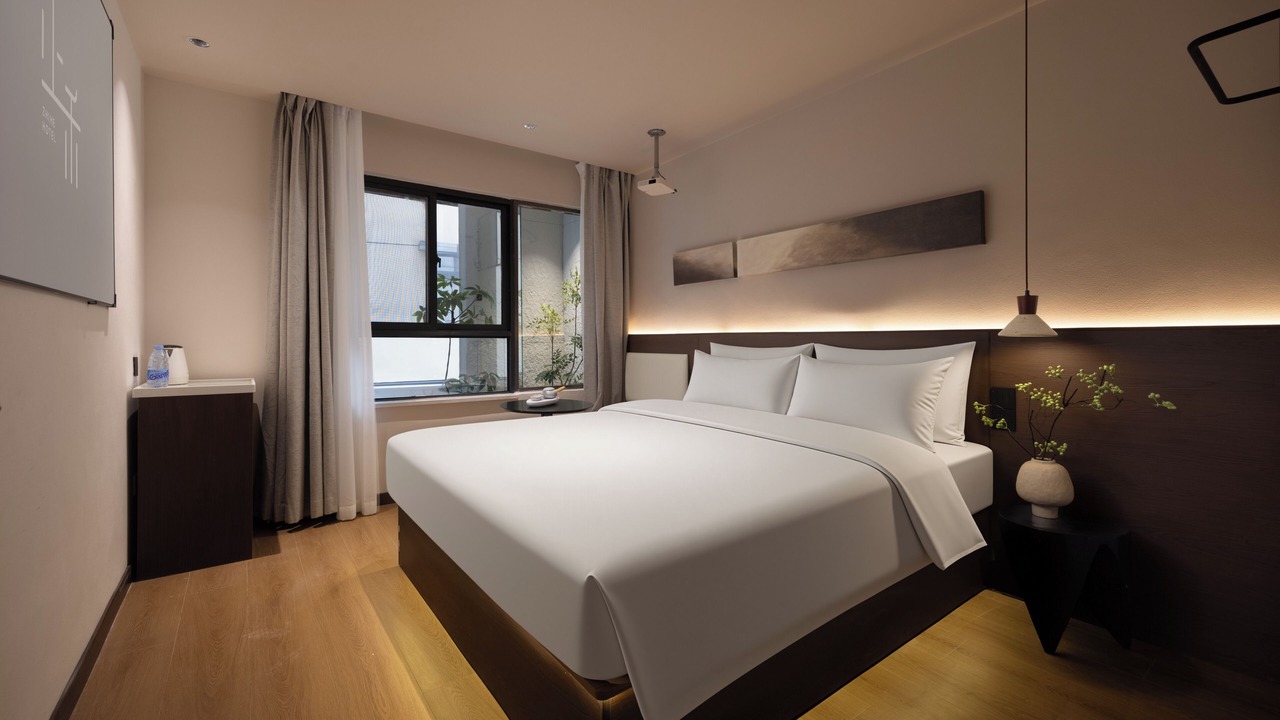 Photo of Bedroom in Jeifangbei Central Business District