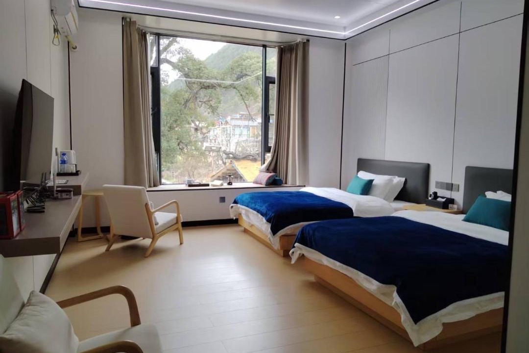 Photo of Bedroom in Deqen County