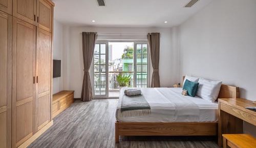 One-Bedroom Apartment with Balcony and City View