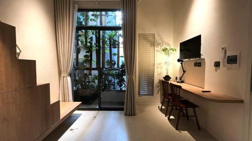 Deluxe One-Bedroom Apartment with Garden View