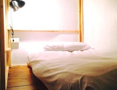 Single Bed in Dormitory Room