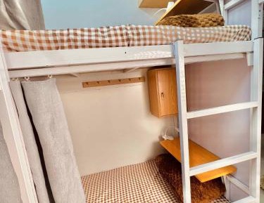 Single Bed in Dormitory Room