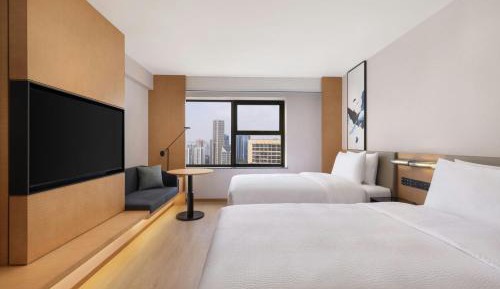 Elegant Skyview Double Room with Two Double Beds and City View
