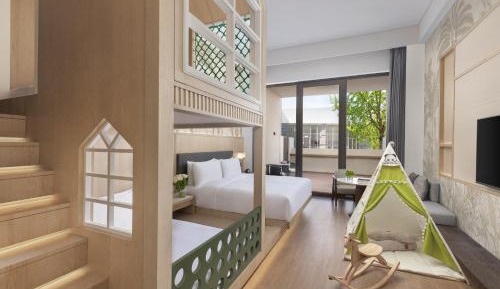 Premium King Room with One King and Bunk Bed