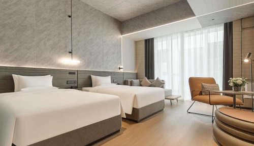 Executive Room Two Single Beds and A Sofa