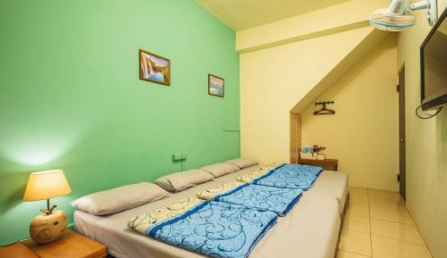 Quadruple Room with Private Bathroom
