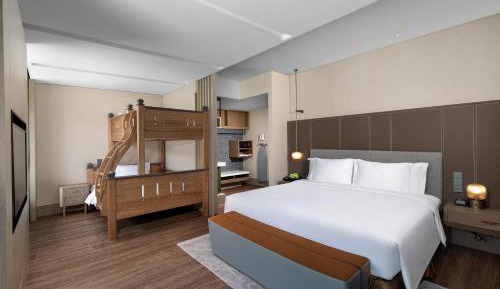 Premium King Room with One King and Bunk Bed