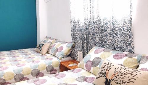 Quadruple Room with Shared Bathroom