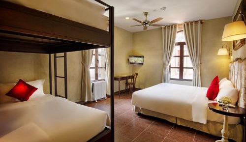 Family Deluxe Room with One King Bed and One Single Bed