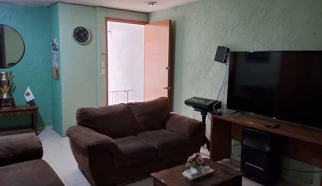 Comfortable and centrally located apartment with private office.